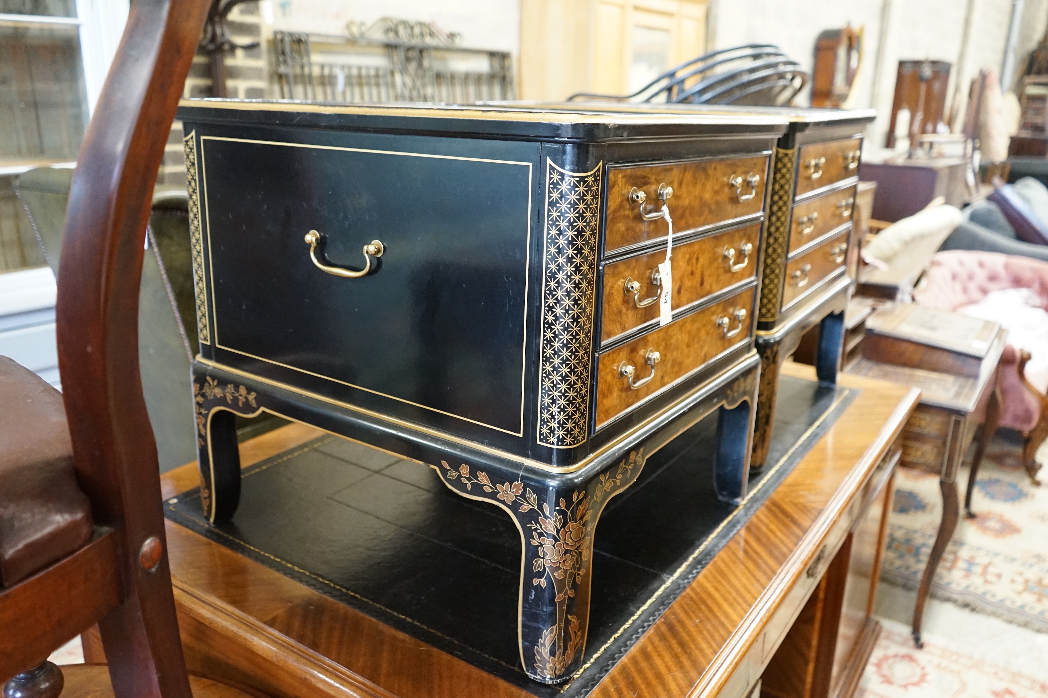 A pair of Drexel chinoiserie decorated, ebonised and pollard oak three drawer tables with glass tops, length 60cm, depth 66cm, height 62cm